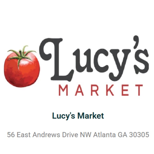 Lucy's Market logo with a red tomato and the words "Lucy's Market" in dark gray and red.